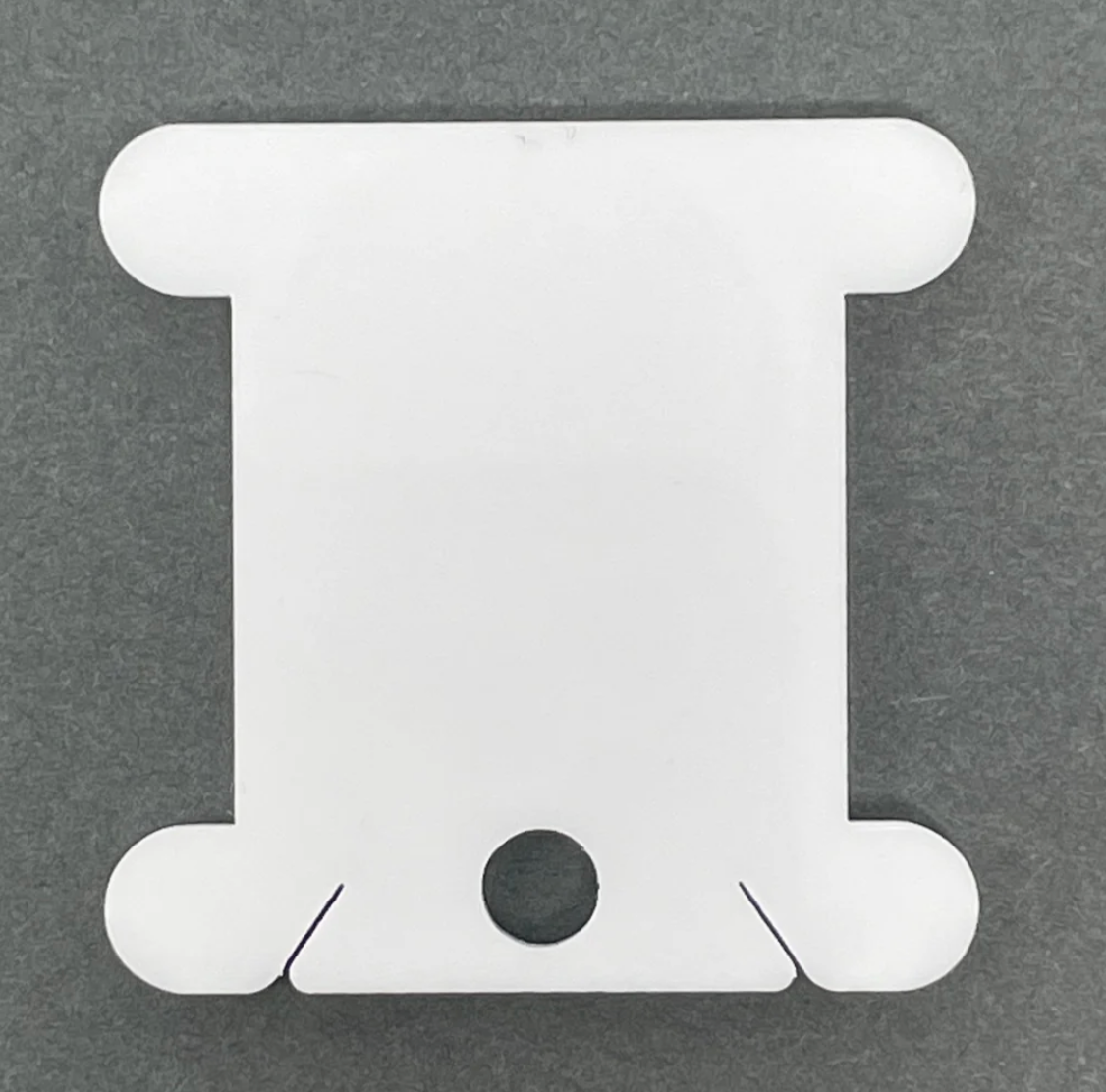 White Acrylic Bobbins (set of 24)