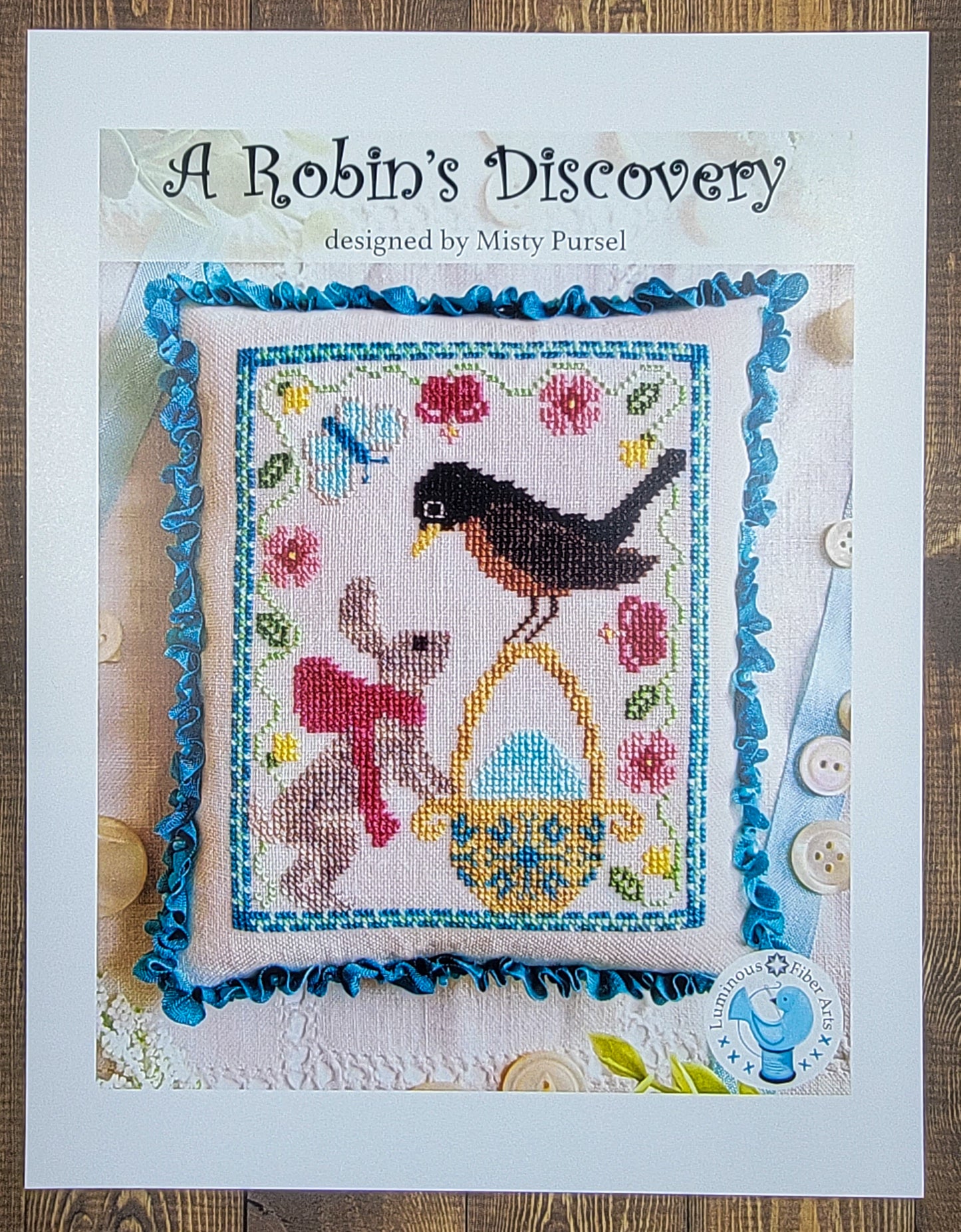 A Robin's Discovery by Luminous Fiber Arts
